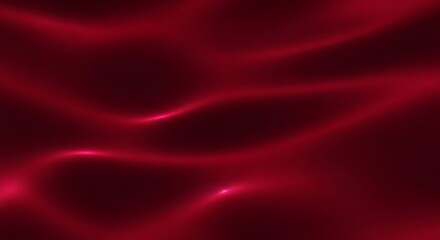 Obraz premium Luxurious red silk fabric with smooth wavy texture and elegant folds.