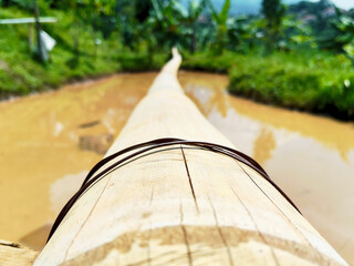 Traditional Bamboo Water Irrigation System in Rice Field
