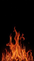 Fototapeta premium High quality photo of Bright Fire Flames Burning with Intense Heat on a Solid Black Background