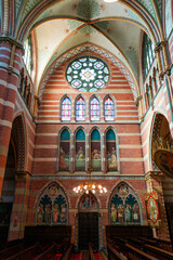 Fototapeta premium Magnificent rose window and neo-Gothic frescoes in Sint-Jacobus de Meerdere church in The Hague (Den Haag), South Holland, The Netherlands