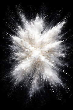 White powder dust explosion isolated on black background, abstract flour or sugar cloud splash overlay texture concept.
