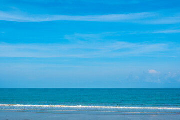 Obraz premium Nature clear sky and summer sea water for summer vacation concept.with sunlight of beautiful clouds blue sky with white altocumulus clouds.with 