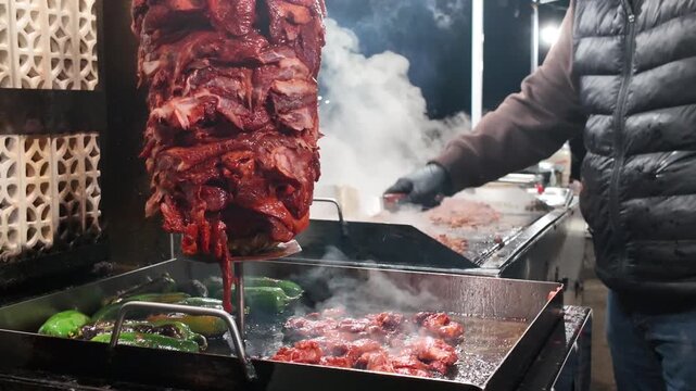 Street Food Al Pastor Cooking with Steam on a Vertical Spit