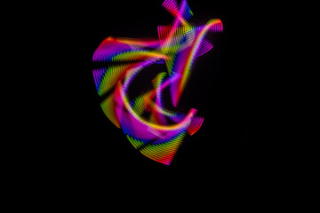 Light painting photograph. Effects created with lights in the dark. Abstract light shapes.