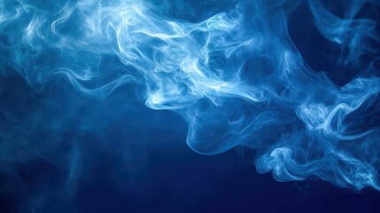 Obraz premium Ethereal Blue Smoke on Dark Background for Abstract Art Projects