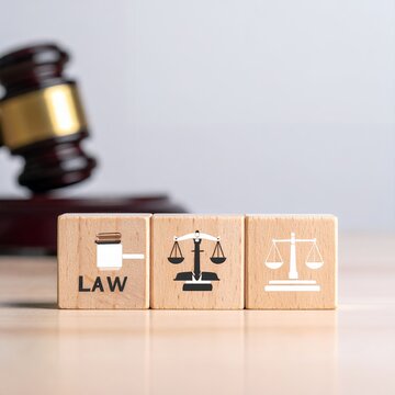 Law and Justice Concept with Wooden Blocks and Gavel.
