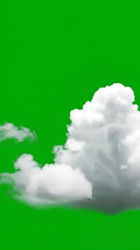 Fluffy white clouds float against a solid green background, creating a visual contrast