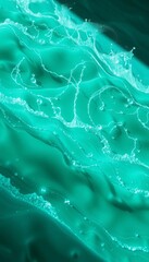 Abstract wave formations in turquoise and emerald mimic flowing hydroelectric power,  renewable,  geometric