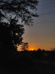 Fototapeta premium Deep orange sunset sky light in the backyard 