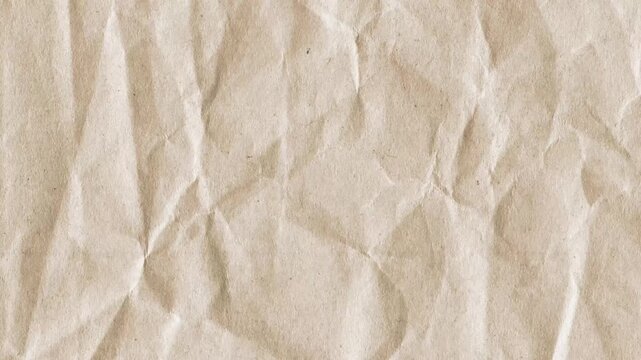 Wrinkled brown kraft paper texture background for vintage design, organic craft projects and creative overlays.