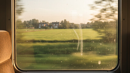 from inside the train with a rural atmosphere