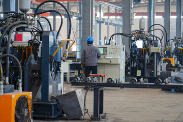 Steel mill workers are directing operations