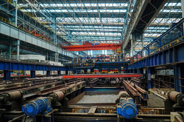 Fototapeta premium The fiery steel billet, the core moment of the rolling mill production line