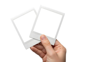 Hand Holding Two Blank Polaroid Instant Photo Frames Mockup Isolated on White or Transparent Background