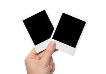 Hand Holding Two Blank Polaroid Instant Photo Frames Mockup Isolated on White or Transparent Background