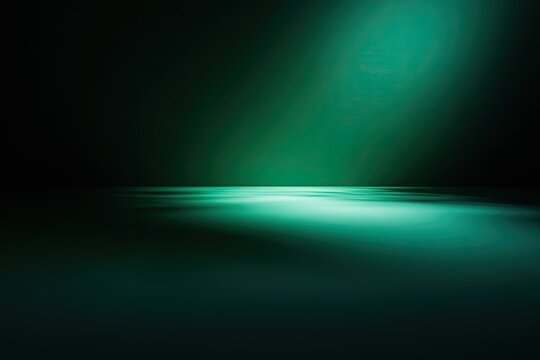 Moody, abstract scene with gradient teal color over a blurred horizontal plane