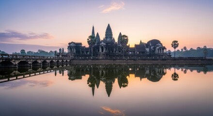 Fototapeta premium Ancient temple complex at serene sunset with reflection in calm water