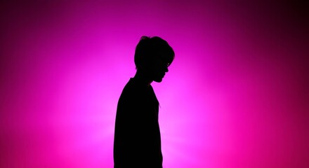 silhouette of a woman in pink dress