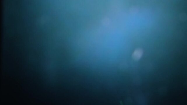 Radiant blue light transition with bokeh for holiday gift guides and festive seasonal marketing