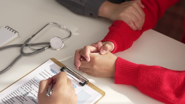 Couple attend fertility or medical consultation with gynecologist at hospital as family planning care for pregnancy while husband consoling young wife through appointment. Slow motion. Rigid.