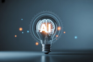 Glowing light bulb on dark background symbolizing ideas and innovation
