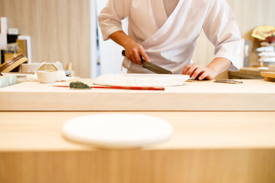 Japanese sushi restaurant with sushi chef background.