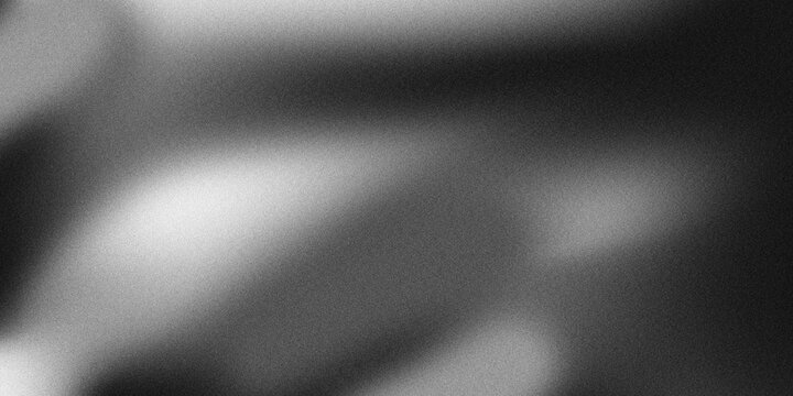 Grainy abstract background with black, grey, and white gradient noise texture. 