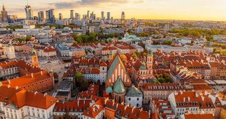 Warsaw old city center and skyscrapers in the background Vistula river. Sunset in Warsaw city center aerial view. © Zedspider