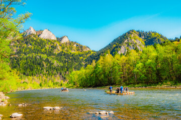 Peak Tri Koruny or Trzy Korony during day with green meadow and trees in spring. Pieniny National park in Slovakia and Poland © Zedspider