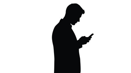 Silhouetted man looking down at a mobile phone in his hands © freelancer