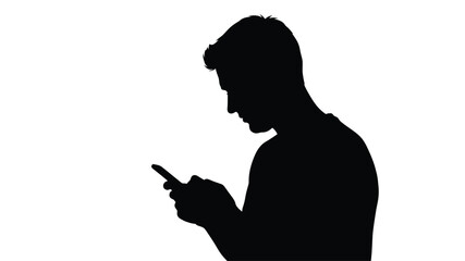 Silhouetted man looking down at a mobile phone in his hands © freelancer