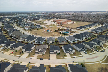 Aerial view American suburban neighborhood with luxury modern houses.