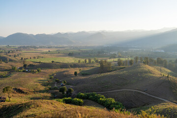 Breathtaking sunset over rolling hills scenic landscape nature tranquil environment