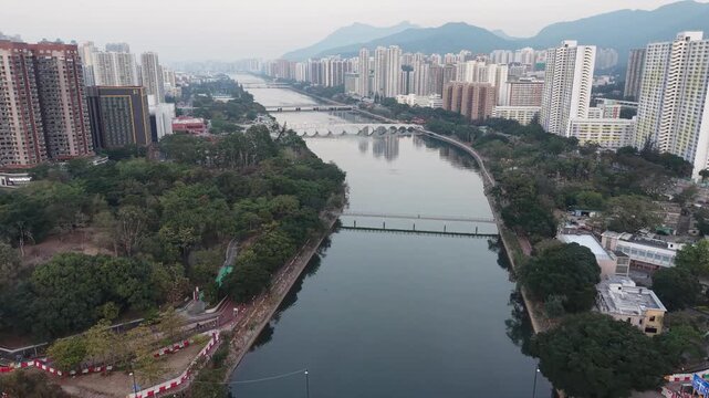 Bright Daylight Reflects Across Water Of Shing Mun River Dec 27 2025