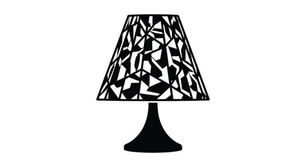 A striking black lamp with a geometrically patterned shade stands prominently against a plain white background silhouette © jivect02