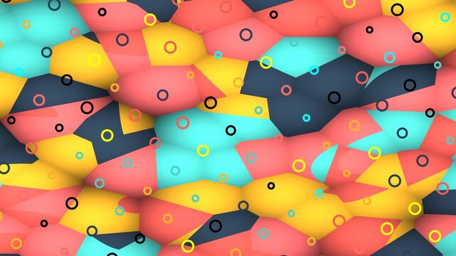 Vibrant abstract pattern featuring colorful rounded cells and scattered rings, creating a dynamic and playful geometric background.