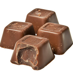 Close-up of four delicious bitten dark chocolate squares isolated on white background