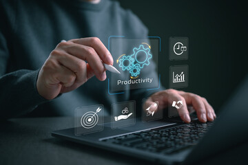 Fototapeta premium Everyday user interacting with an AI productivity dashboard on a laptop, showing workflow automation, performance optimization, task management, data-driven efficiency accessible to everyone.