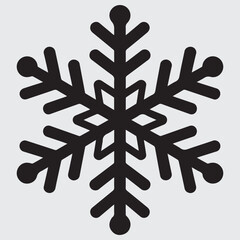 Obraz premium A detailed black silhouette of a single snowflake on a gray background
