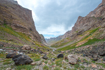 Fototapeta premium Heaven and Hell Valley. Cilo Mountains, Hakkari, Heaven and Hell Valley. Streams formed from glaciers. The magnificent Heaven and Hell Canyon. Amazing trekking routes in Hakkari. Turkey. 