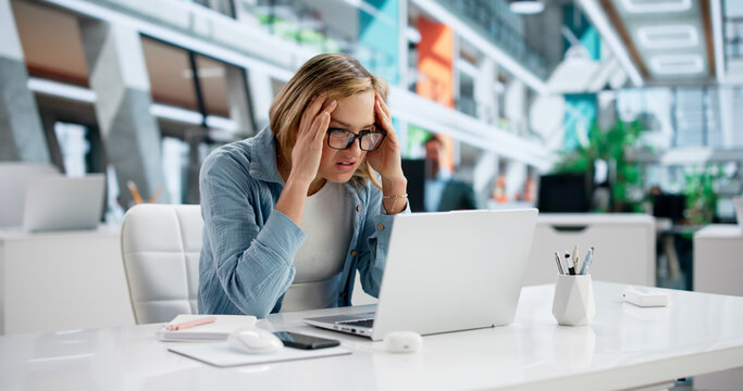 Female Executive Dealing With Cyber Attack: Ransomware Breach
