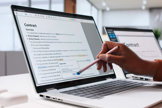 Professional African American Woman Editing Document