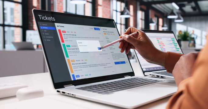 Professional African American Woman Monitoring Support Tickets