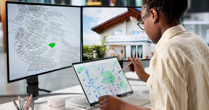 Woman Searches Online For Real Estate Properties Using A Land Map