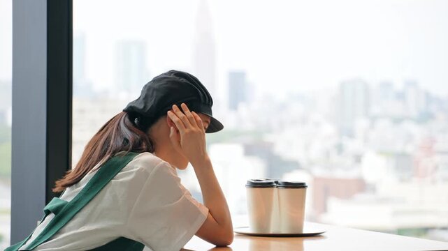 A restaurant employee worried inside the store