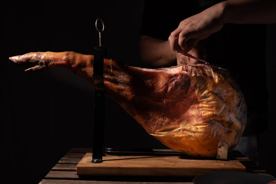 Thin slice cut by a specialist in Iberian ham.