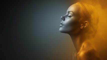 Obraz premium Transformation From Dull Grey to Golden Radiance on a Human Face With Soft Lighting in an Artistic Setting