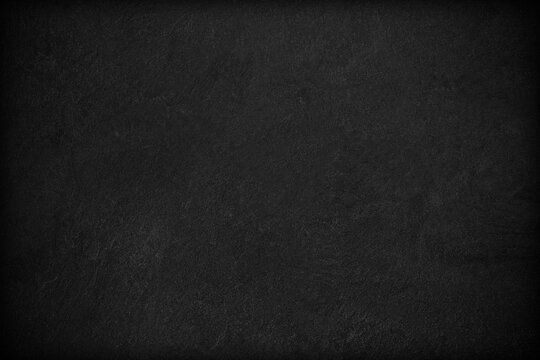 Dark grey black slate background or texture.
