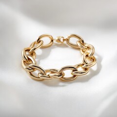 Obraz premium Elegant Gold Tone Bracelet Isolated on White Studio Background