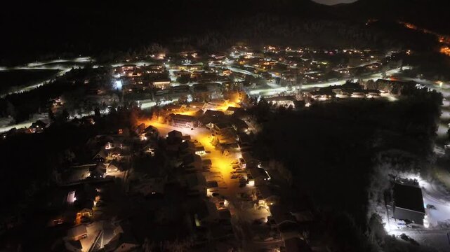 Aerial nighttime view of the suburban area of Storbakken on the island of Freioeya in Kristiansund municipality, Norway.
